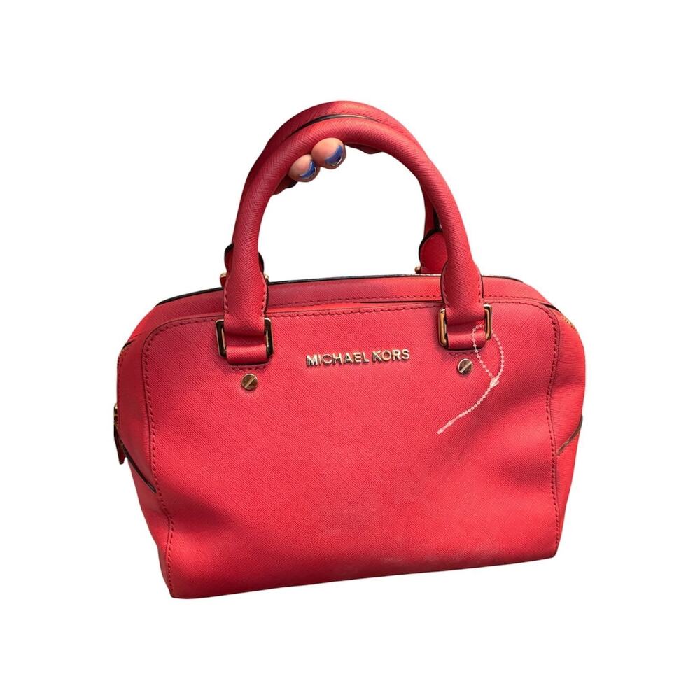 bright pink Michael Kors Savannah saffiano leather satchel bag.